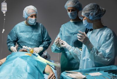 different-doctors-doing-surgical-procedure-patient